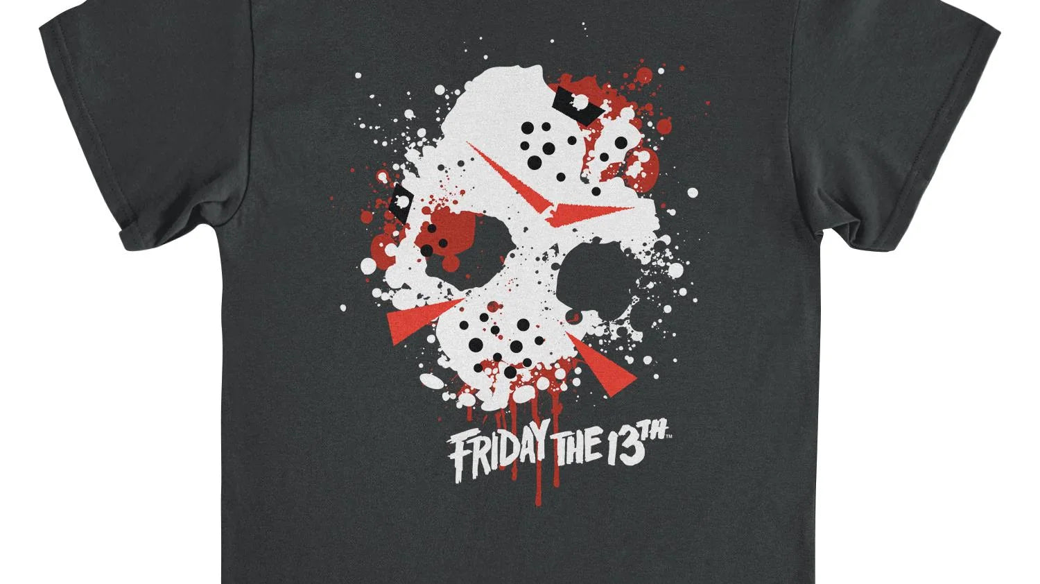 An image of a black Friday the 13th movie t-shirt showing a splattered paint version of Jason's mask from the Friday the 13th movie. The logo from the movie is below the mask.