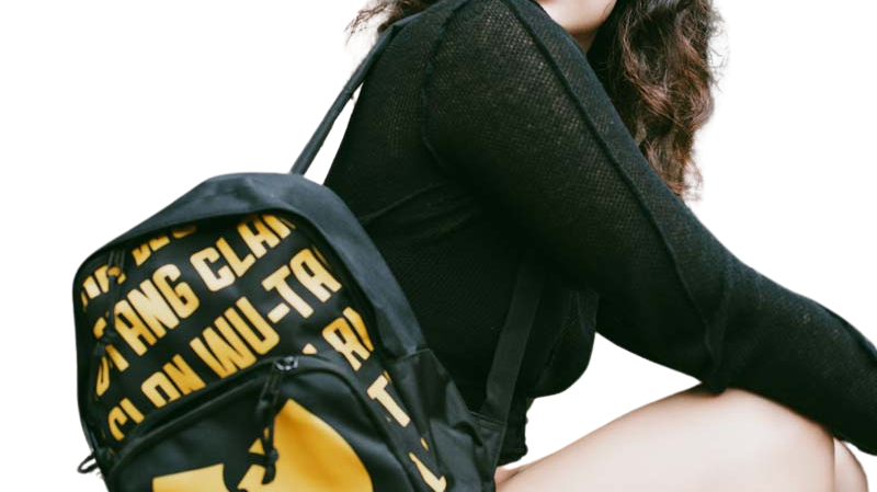 A young woman with a Rocksax Wu-Tang Clan backpack slung over her shoulder.