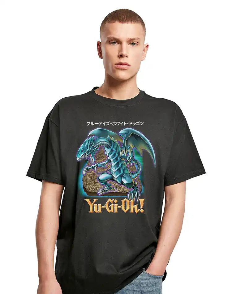 Person wearing a black Yu-Gi-Oh! t-shirt with a dragon graphic on a white background